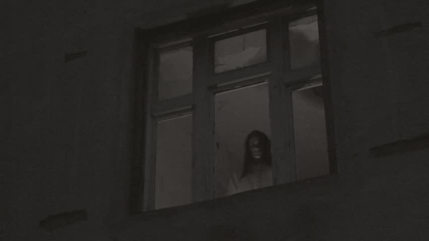 Horror Scene of a Scary Female Ghost at the Window Royalty-Free Stock Footage #4191694
