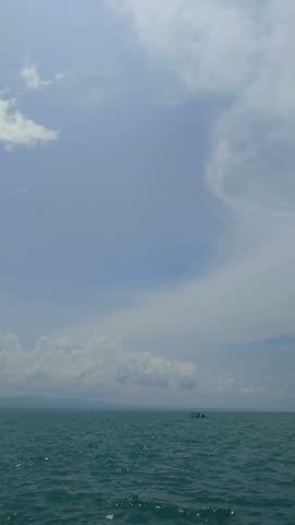 Sea, seascape, horizon, waves, clouds.