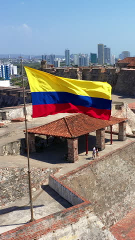 Colombian flag waving at Castillo San Felipe de Barajas in Cartagena, Colombia