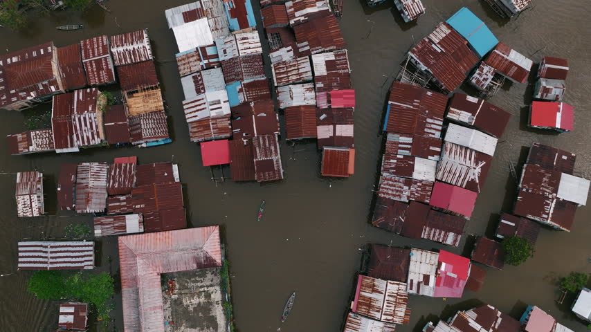 Wooden Houses Built Over Floodwater Aerial View