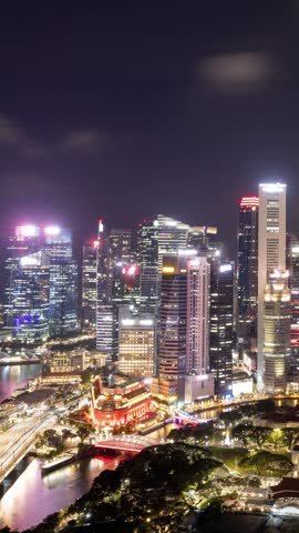 Time lapse of the Singapore skyline at night. Vertical video.