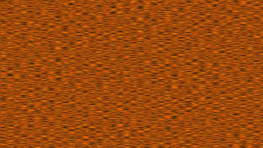Abstract textured background with warm orange and brown tones and subtle dark speckles