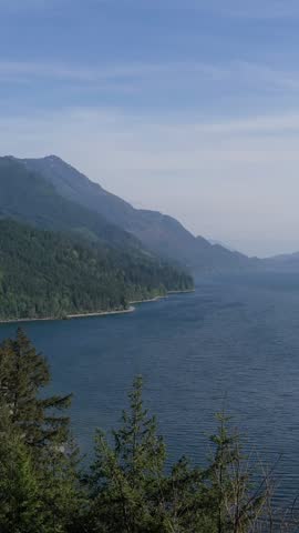 Panoramic View of Harrison Lake in British Columbia, Canada, with Majestic Mountains and Lush Forests