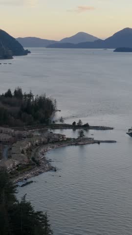 Coastal Residential Area Along Howe Sound in British Columbia, Canada, Framed by Majestic Mountains