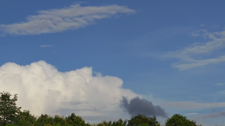 Clouds Appearing In Clear Blue Sky