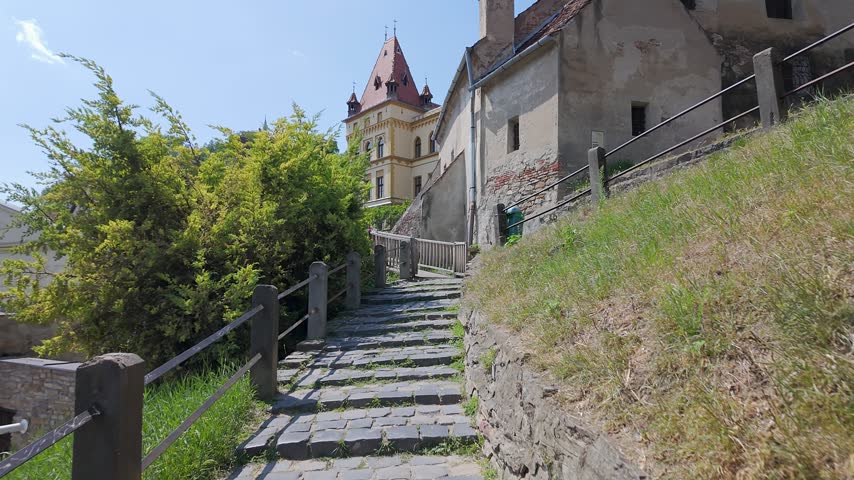Stone steps leading through the historic Old Town of Sighisoara in Transylvania Romania