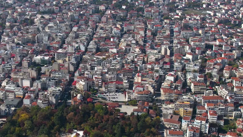 Aerial view around the city and old town Karditsa  on a sunny day in Greece
