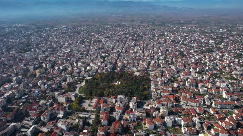 Aerial view around the city and old town Karditsa  on a sunny day in Greece