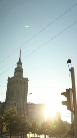 Vertical screen Palace of Culture and Science historic Stalinist architecture in central Warsaw Poland rising above the surrounding urban landscape