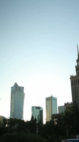 Vertical screen atmospheric view of the Palace of Culture and Science in Warsaw Poland with monumental architecture and surrounding city streets