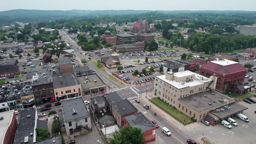 Approach Aerial of Marquette Michigan on an overcast summer day in the Upper Peninsula.