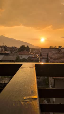 Sunset over a town with mountains in the background, Bulgaria