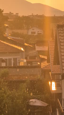 Sunset over a residential area with mountains in the background, Bulgaria
