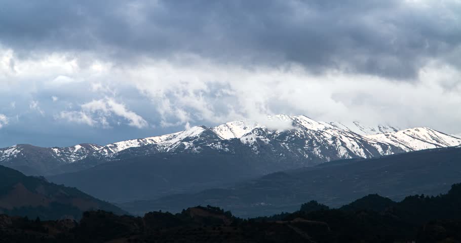 Snow-Covered Mountain Peak in Stunning 4K Winter Landscape.