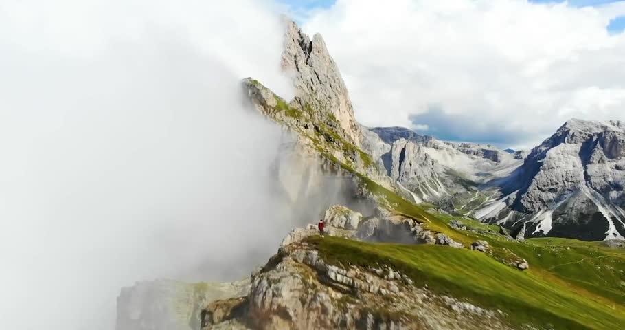 Misty Mountain Peak Rising Above Thick Fog in Stunning.