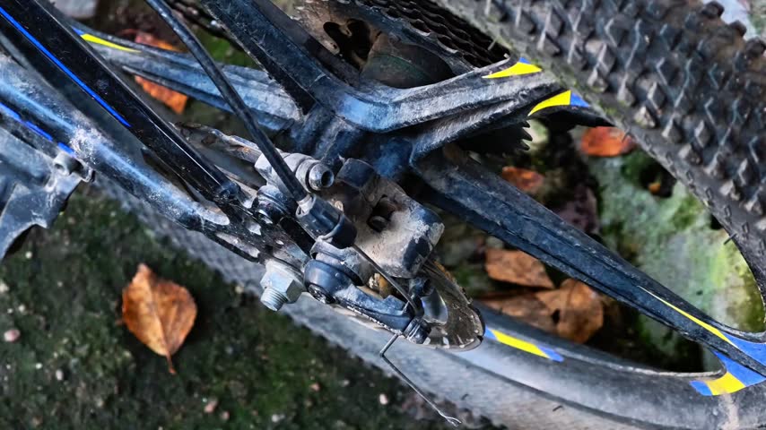 A close up view of a bicycle chain, ideal for use in outdoor or sports-related contexts.
