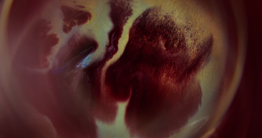 Color paint. Defocused bright splash. Red purple yellow circle rainbow glitter water texture round acrylic fluid spill on abstract art background.