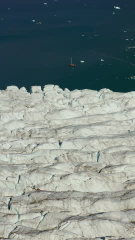 Glaciers Flow Directly Into The Sea In Greenland. Vertical, Aerial Shot