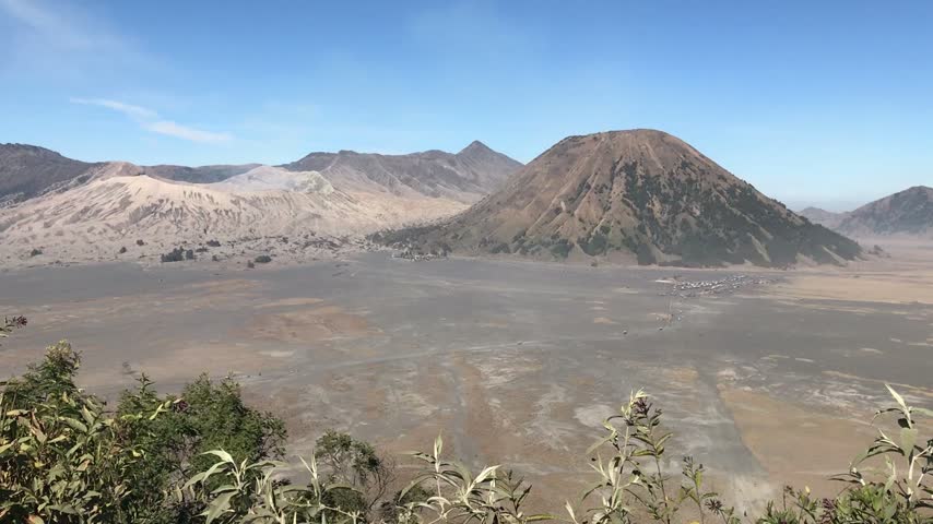 Stunning view of Mount Bromo in Bromo Tengger Semeru National Park, East Java, Indonesia, showcasing a dramatic volcanic landscape surrounded by mountains and scenic natural scenery.