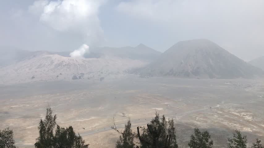 Stunning view of Mount Bromo in Bromo Tengger Semeru National Park, East Java, Indonesia, showcasing a dramatic volcanic landscape surrounded by mountains and scenic natural scenery.