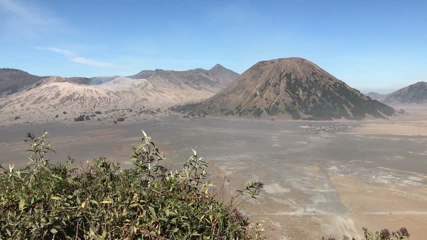 Stunning view of Mount Bromo in Bromo Tengger Semeru National Park, East Java, Indonesia, showcasing a dramatic volcanic landscape surrounded by mountains and scenic natural scenery.