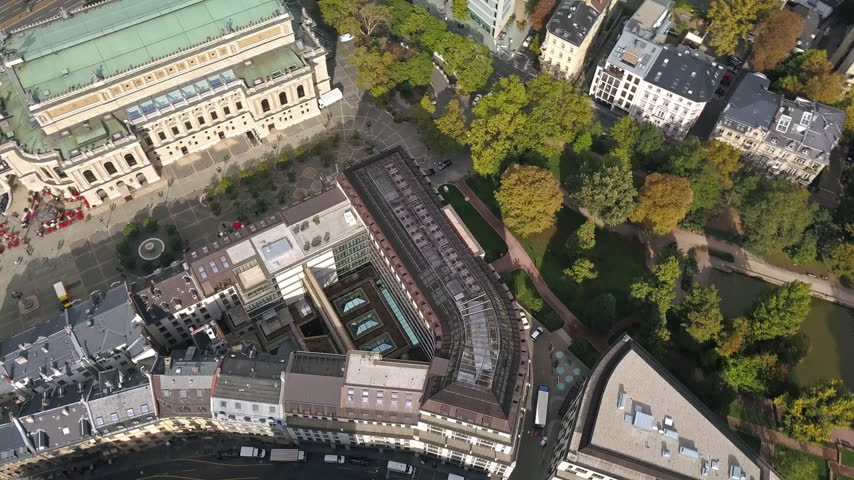 Aerial drone footage of the city center, the business district and hotels in Frankfurt am Main in Germany in the European Union. Frankfurt is the financial and banking capital of Germany and Europe.