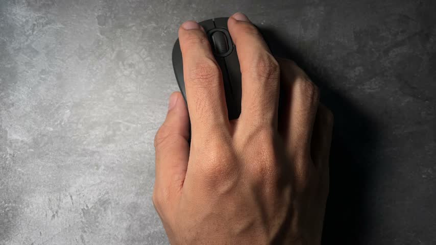 man hand using black computer mouse on desk