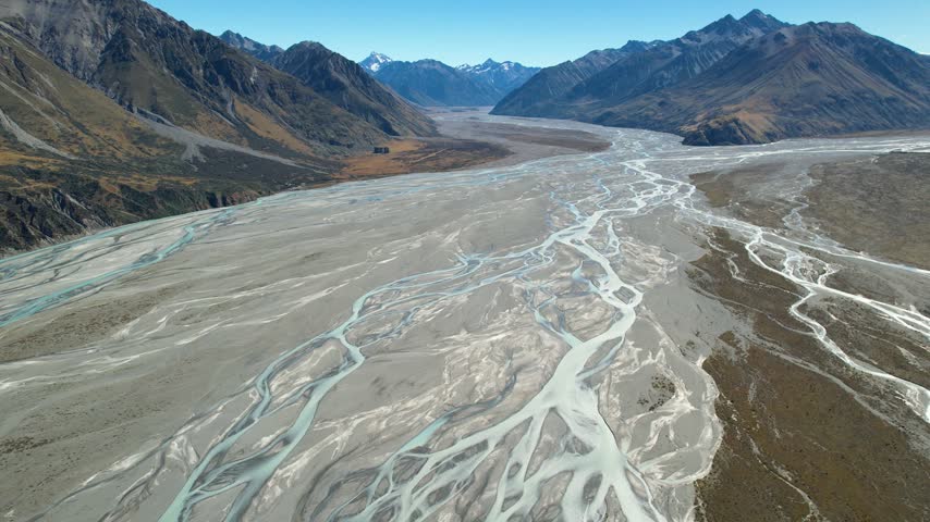 Epic Aerial Landscape of Mount Sunday, Edoras and the Southern Alps in New Zealand