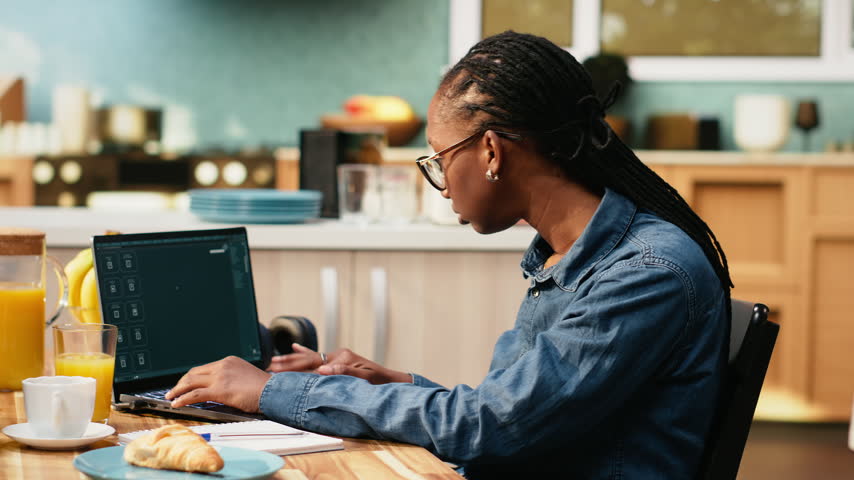 Woman interacting with AI image generator through chatbot interface on laptop, artificial intelligence and text-to-image software