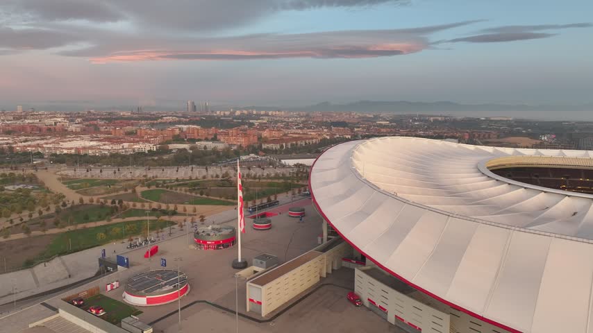Aerial view of Riyadh Air Metropolitano Stadium with its distinctive roof and surrounding urban landscape in Madrid, Comunidad de Madrid, Spain.
