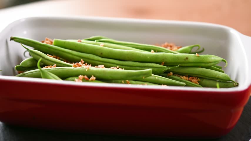  Green beans with crispy onions rotating in casserole dish