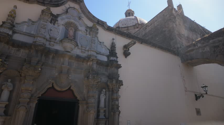 Ornate facade of Ciudad Guzman Cathedral in Ciudad Guzmán, Jalisco under clear sky