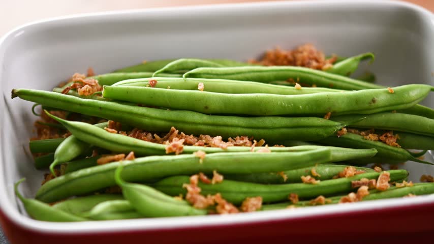  Green beans with crispy onions rotating in casserole dish