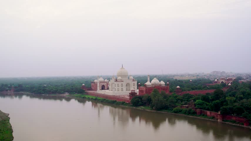 Aerial view of the Taj Mahal, a white marble mausoleum, situated on the banks of the Yamuna River in Agra, Uttar Pradesh, India.