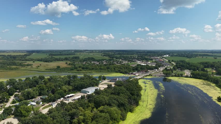 Drone View of Delavan, Lake Lawn in Wisconsin USA, Green Landscape and Traffic on Sunny Summer Day