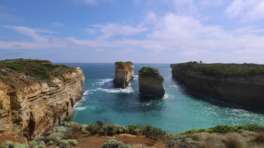 Panoramic view of Tom and Eva limestone rock stacks off Loch Ard Gorge on the Great Ocean Road coast Victoria Australia, Twelve Apostles National Park