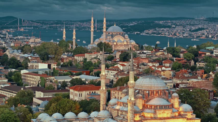 Wide bird’s-eye aerial view of Istanbul, Turkey, showcasing the expansive cityscape, urban architecture, waterfront, Bosporus Strait, bridges and modern skyline from above.