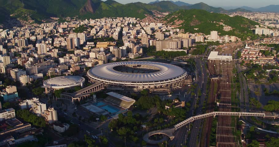 Aerial view of Maracana Stadium surrounded by the dense urban landscape of Rio de Janeiro, Rio de Janeiro, Brazil.
