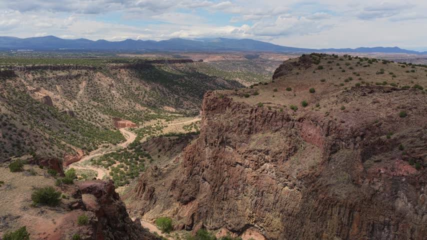 Aerial view of the rugged rock formations and deep canyon landscape at Diablo Canyon Recreation Area in Santa Fe, New Mexico, United States.