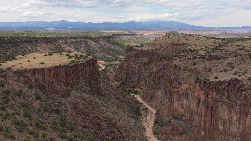 Aerial view of the rugged rock formations and deep gorge of Diablo Canyon Recreation Area in Santa Fe, New Mexico, United States.