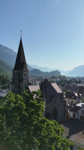 An old medieval church in the Swiss Alps near Interlaken vertical video.