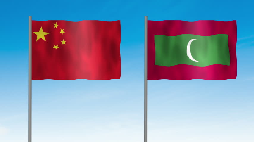 Flag of Maldives and China, Pole flag of Maldives and China on clear sky background. Maldives and China flag waving. 
