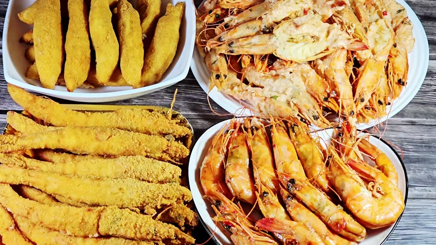 seafood plates featuring various preparations of fried and grilled shrimp, including crispy breaded shrimp fingers, whole fried shrimp, shrimps with butterfly sauce and crispy fried fish fillet filet
