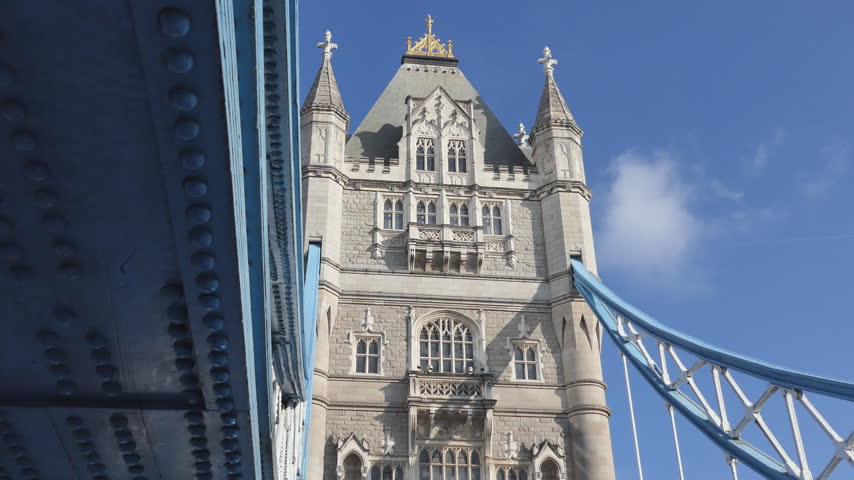 Tower Bridge Gothic Architecture and Blue Suspension Cables
