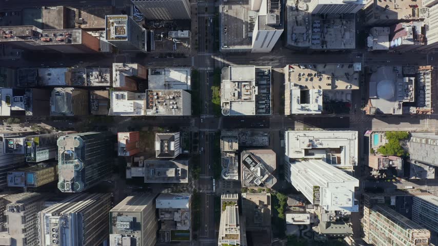 Aerial view of the dense urban grid of skyscrapers and city streets in downtown Chicago, Illinois, United States.