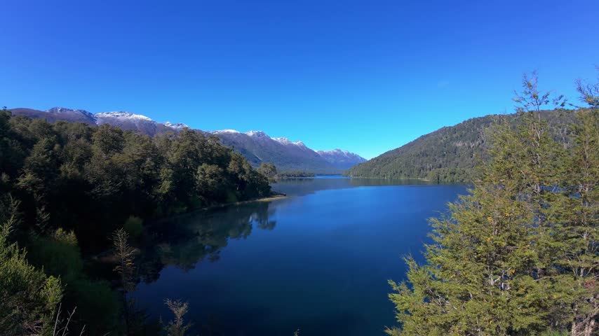 Mountain Lake With Beautiful Mountain Reflections Along The Ruta De Los Siete Lagos In Argentina