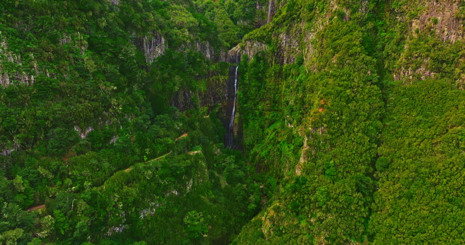 Aerial view of an incredibly beautiful, tall waterfall