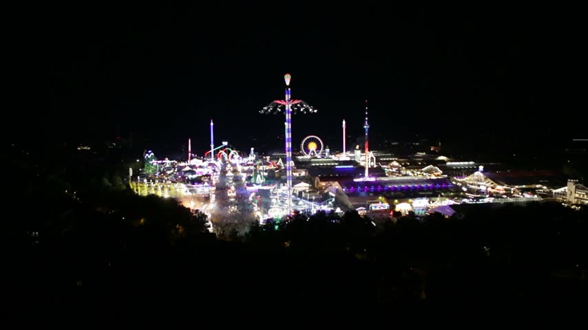 Oktoberfest 2026 Festival Lights and Amusement Rides in Munich, Germany, Static and Pan shot