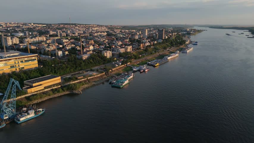 Aerial view of Danube River and ships with the City of Ruse, Bulgaria in the background