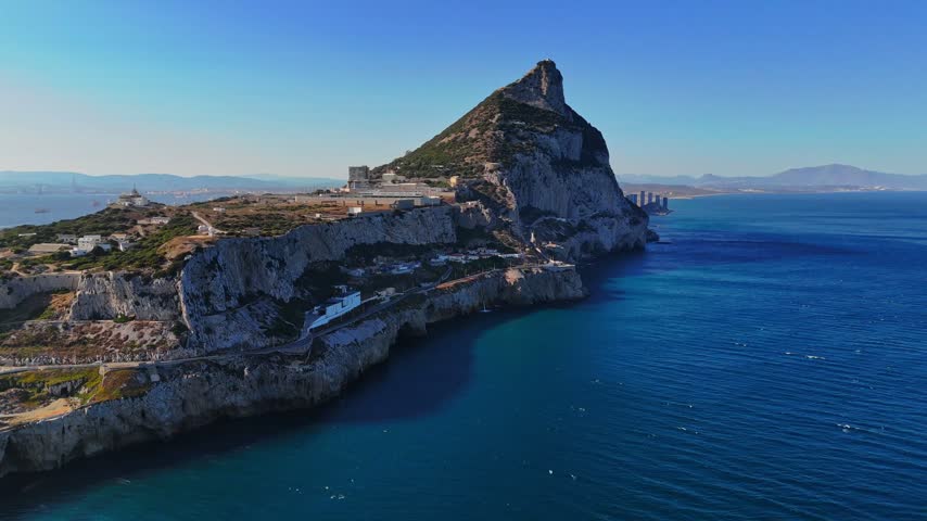 Aerial view of Europa Point and the iconic Rock of Gibraltar rising above the Mediterranean Sea, Gibraltar, Gibraltar.